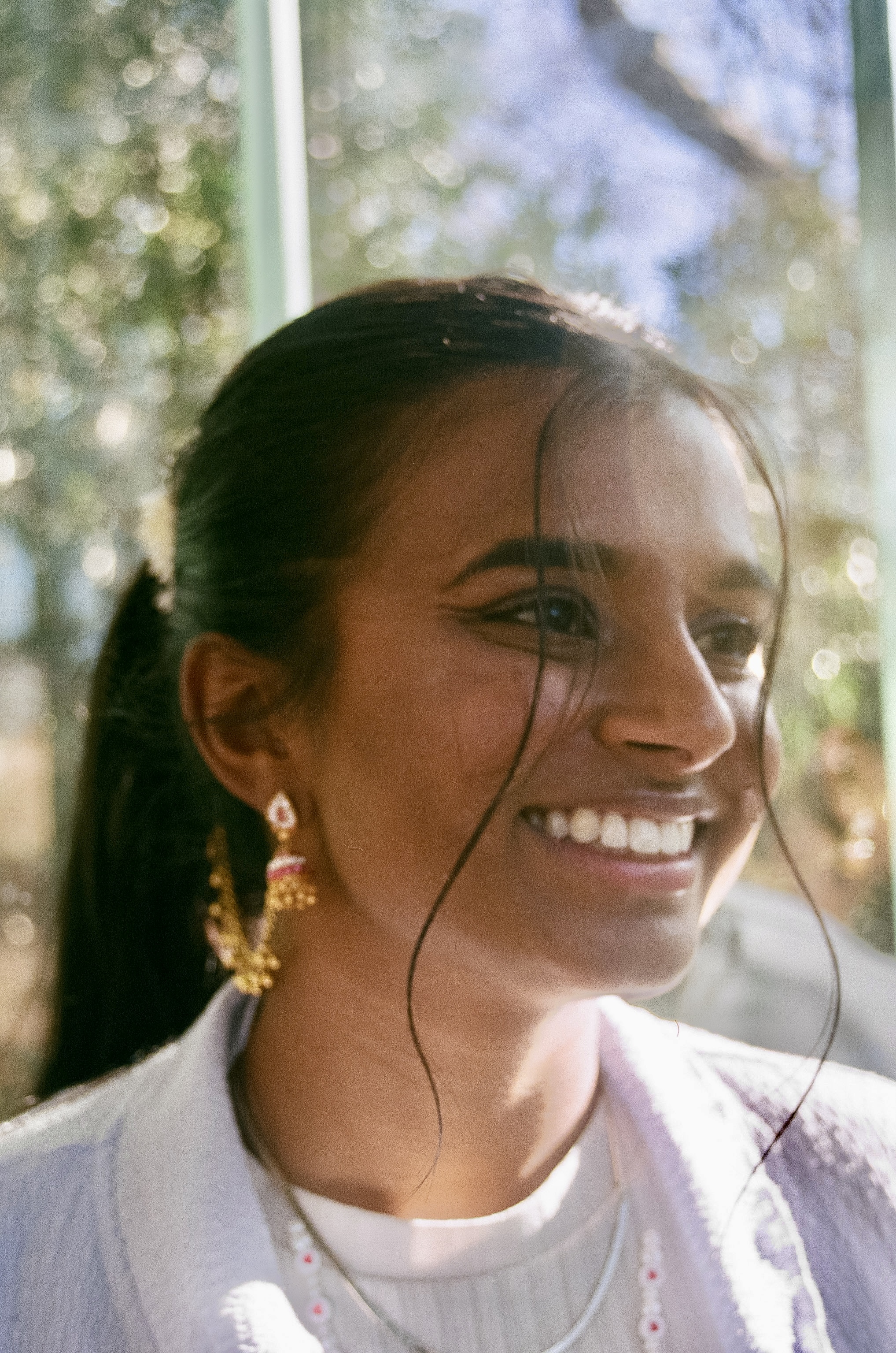 Neha in colorful jacket